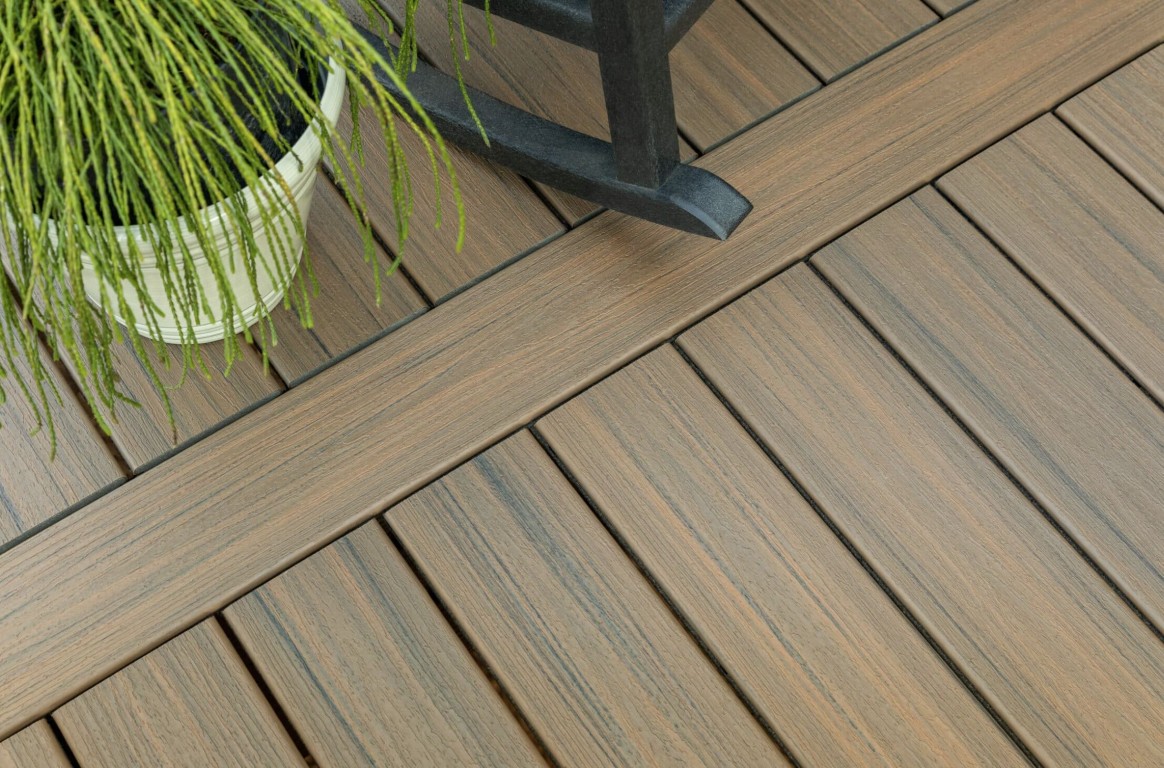 Composite deck installation with wood-grain texture in Eastvale, CA